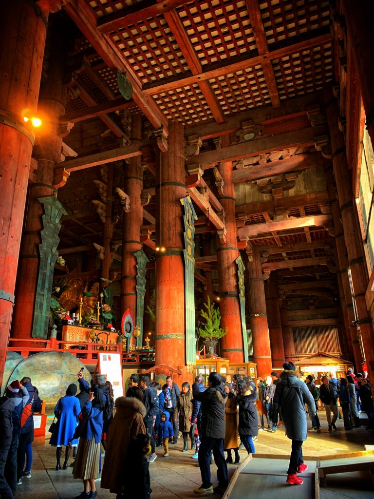 Inside of Todai-ji temple with tourists