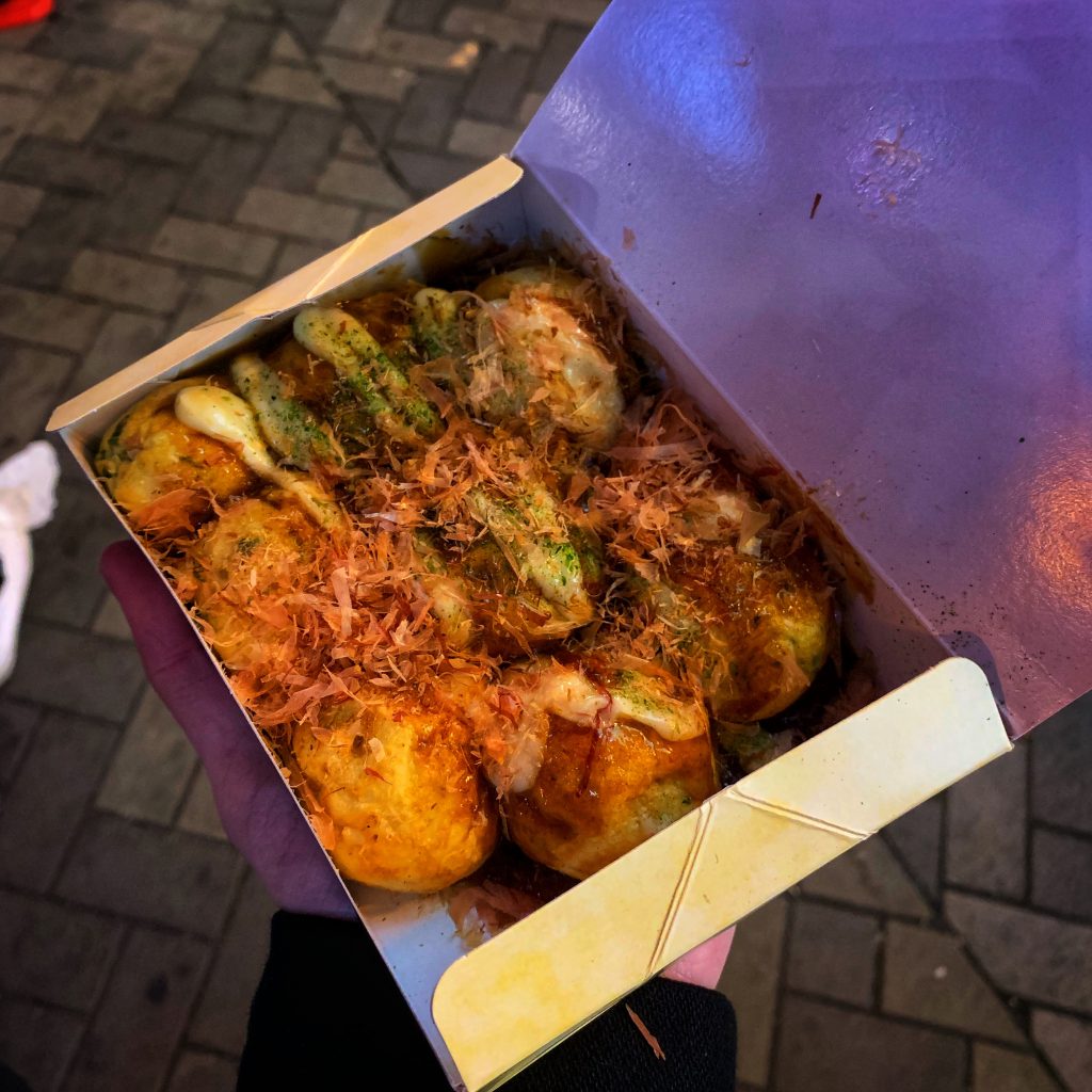 8 Takoyaki in a takeout box