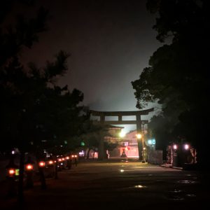 Night time photo of a Japanese gate