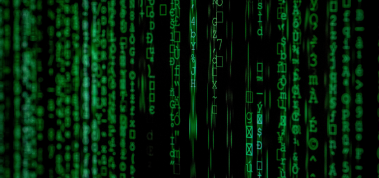 A digital image displaying a matrix of green alphanumeric characters cascading vertically on a black background, reminiscent of digital data streams or the iconic 'Matrix' code rain.
